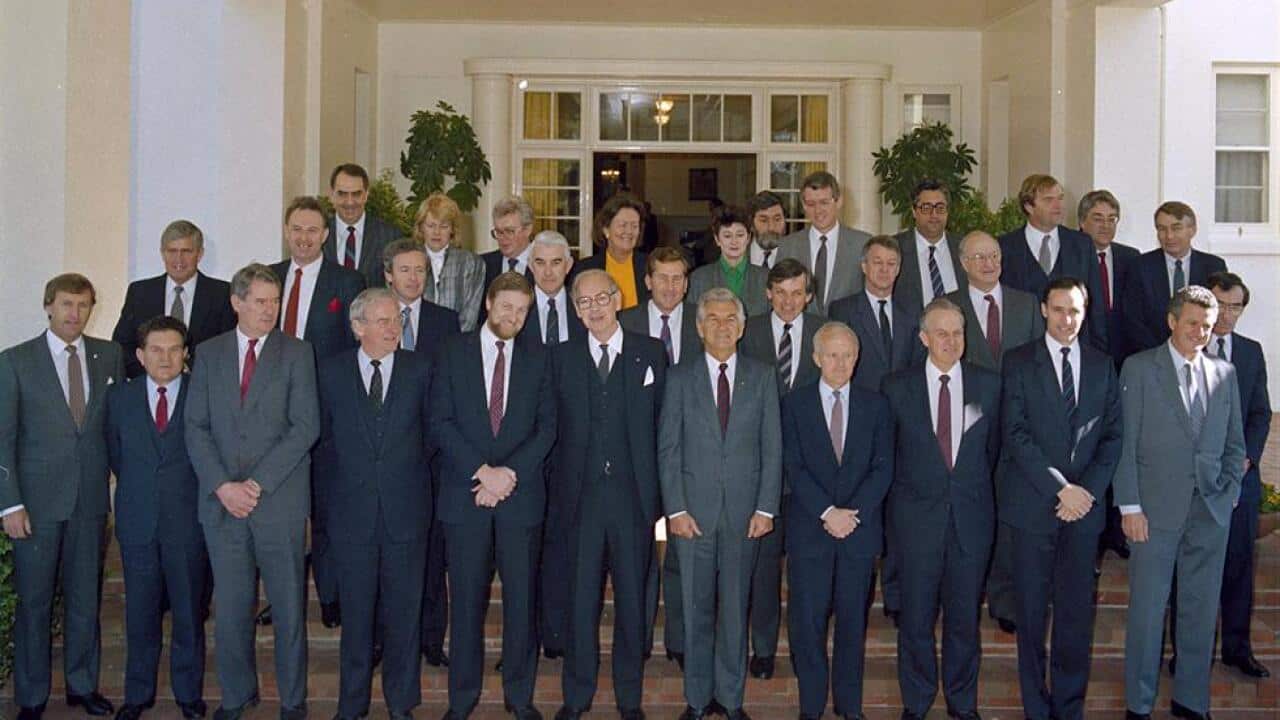 Bob Hawke's third ministry on the steps of Government House, after the swearing-in after the 1987 election. NAA: A8746, KN24/7/87/2